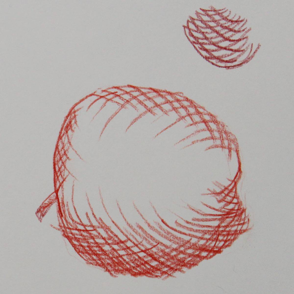 Red colored pencil drawing of an apple with contour hatching to create volume and dimension.