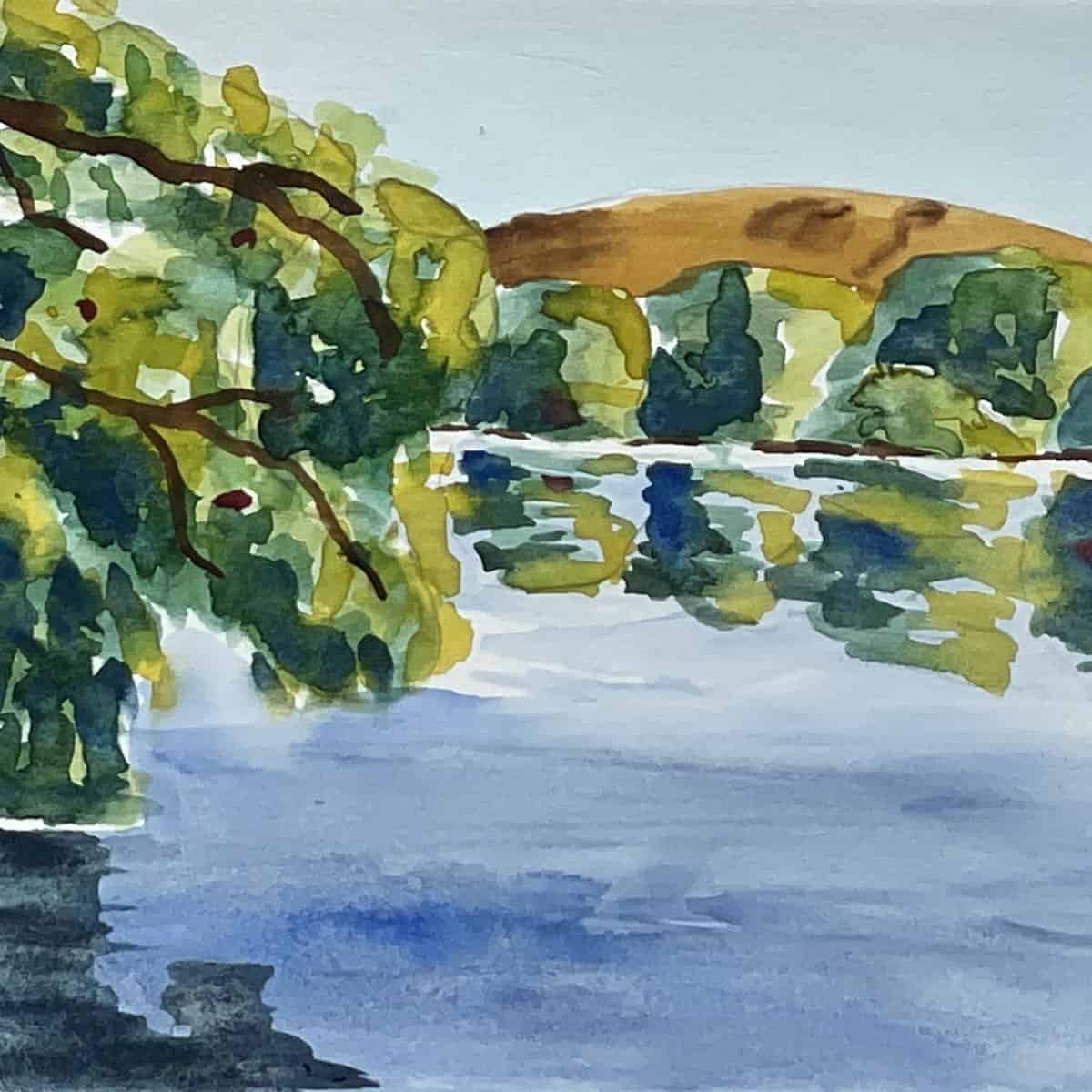 Painting of a watercolor lake scene with trees, a hill and reflections on the water.
