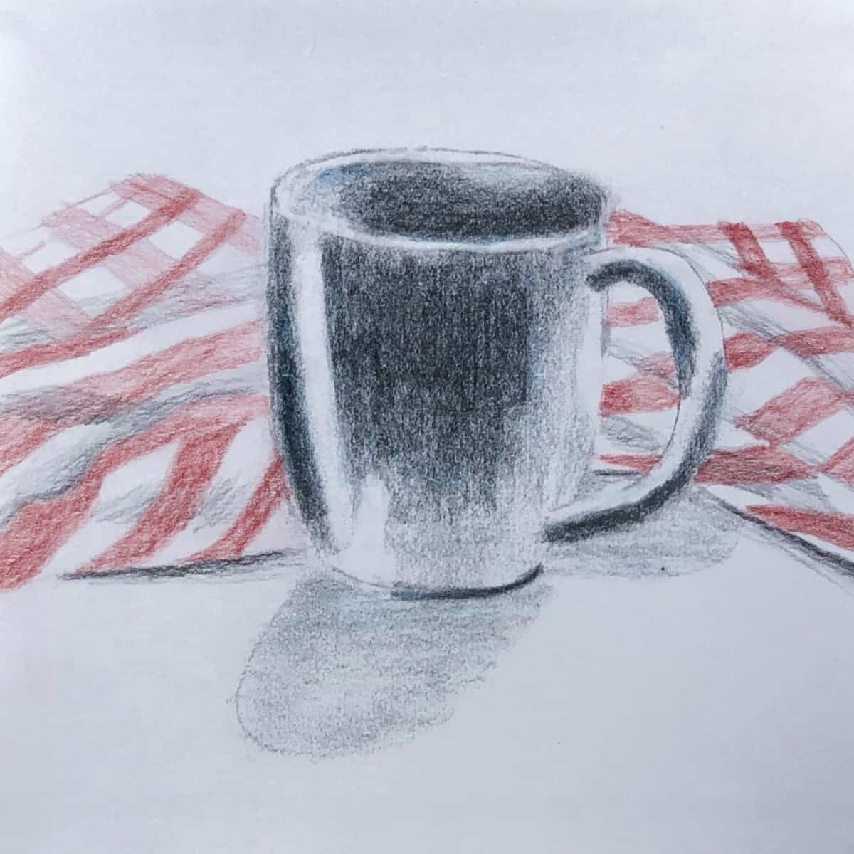 Sketch of a light blue coffee cup in pencil and colored pencil with a red and white checkered napkin.