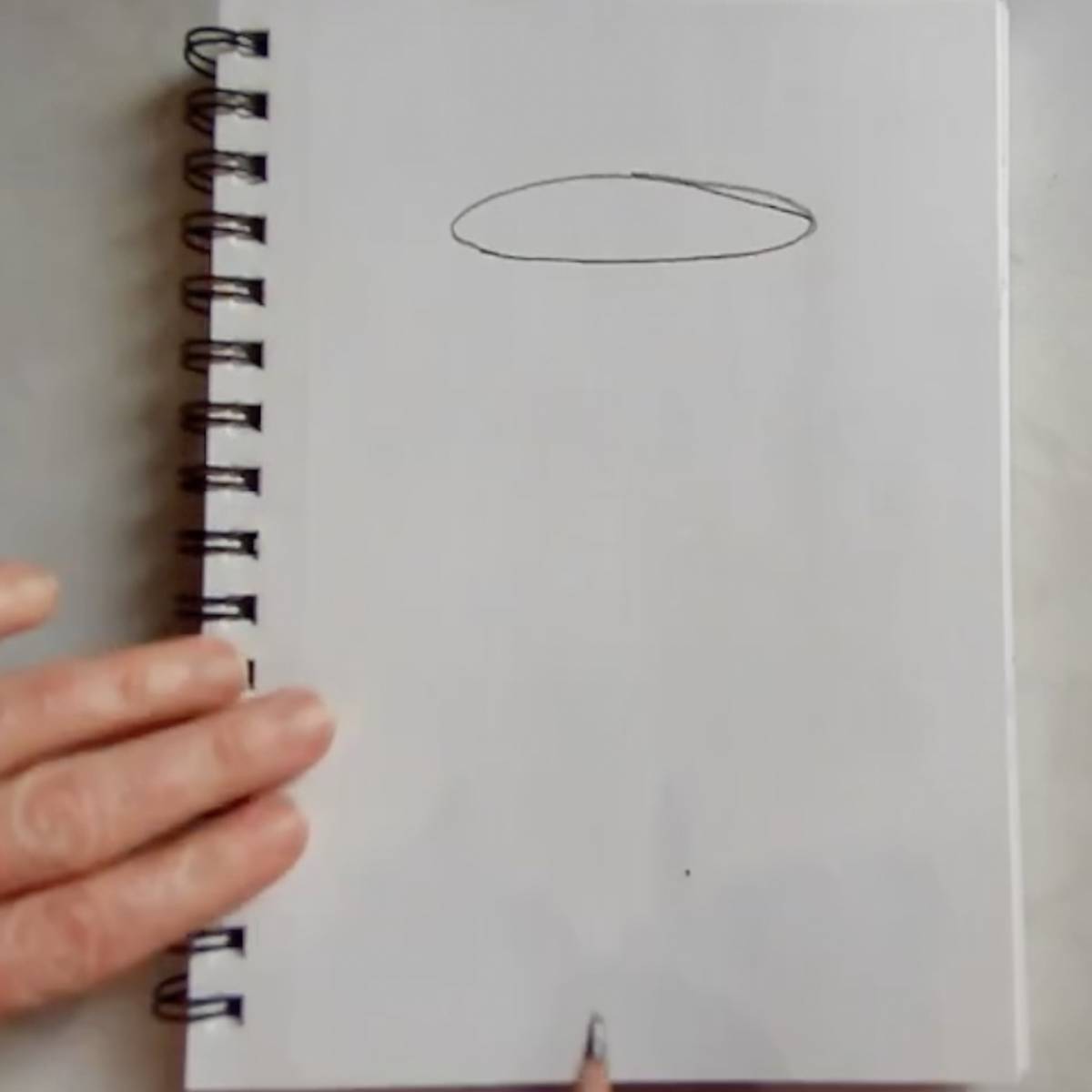 Draw an oval for the top