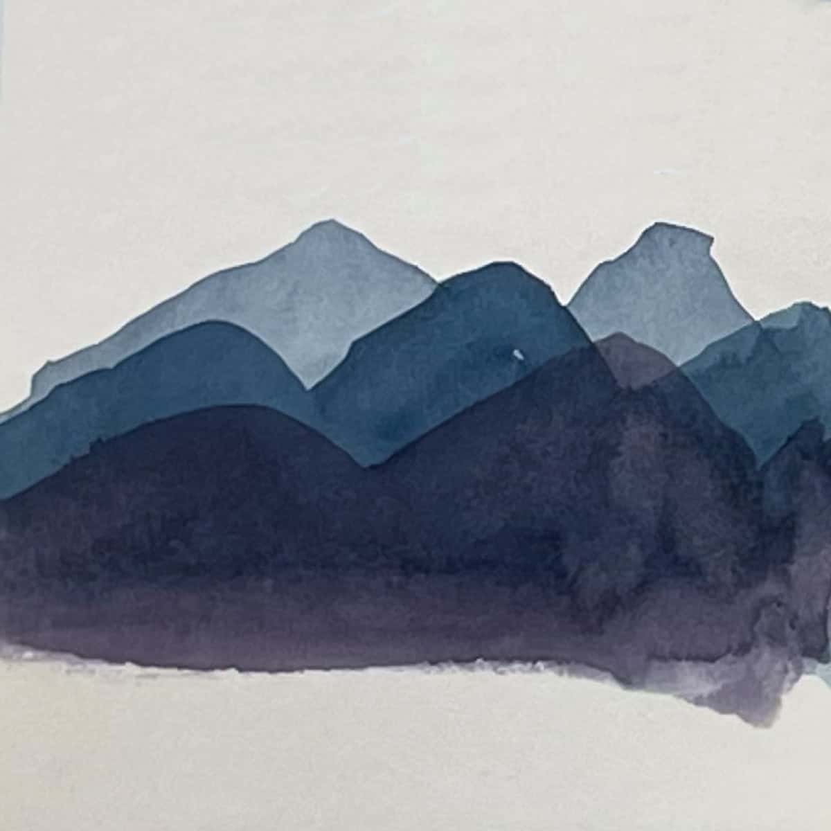 Layered painting technique of a watercolor mountain.