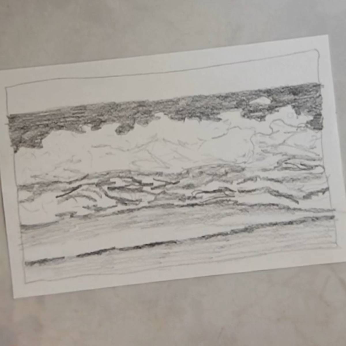 Final seascape sketch on table top.