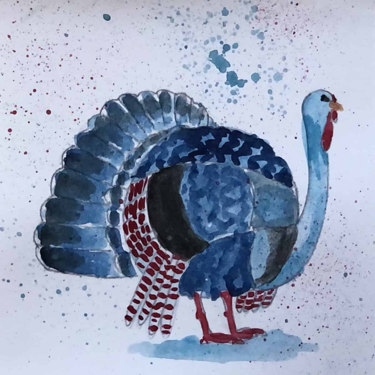 Watercolor painting of a turkey in bright blue paint with splatters over it.