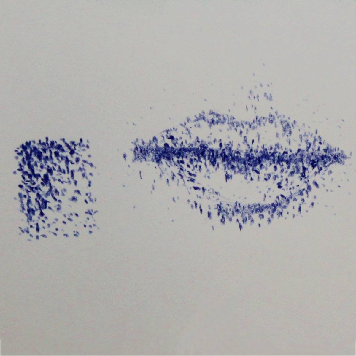 Dark blue colored pencil stippling dots shade in and create the form of human lips.