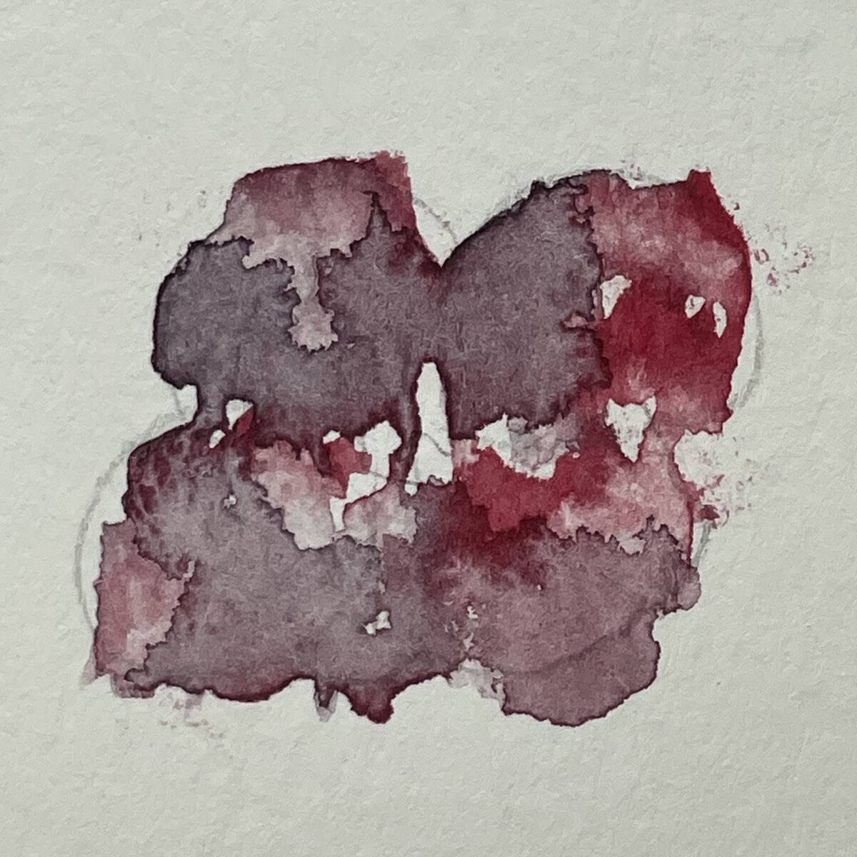 A watercolor painting of a pansy that shows a blotting technique.