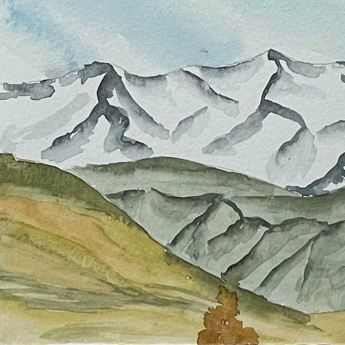 Up close painting of a watercolor mountain landscape.